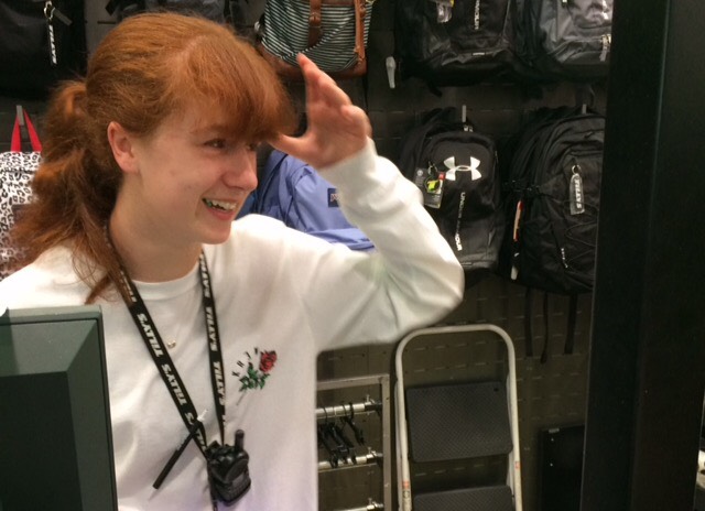 Sophomore Elly Blatcher helping a customer at Tilly's